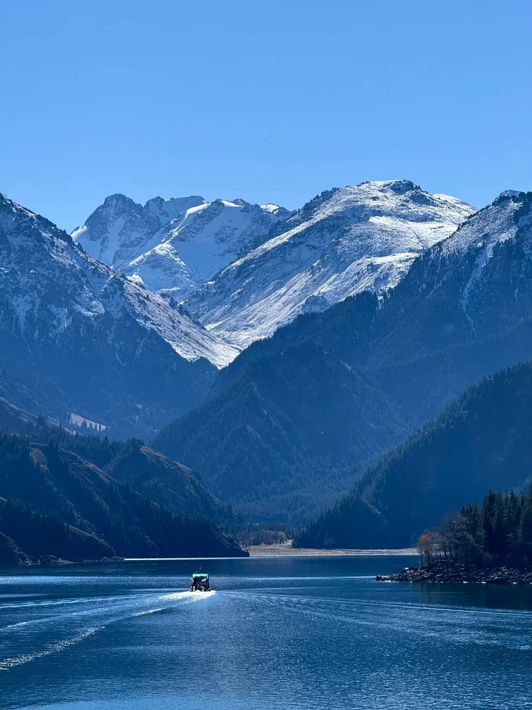 Snow mountain and alpine lake scenery for a ten day slow Yunnan route