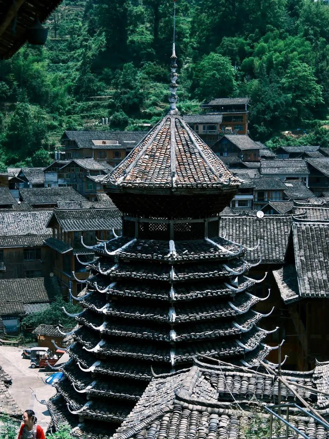 Dong village drum tower and wooden rooftops for a Guizhou Miao and Dong villages route