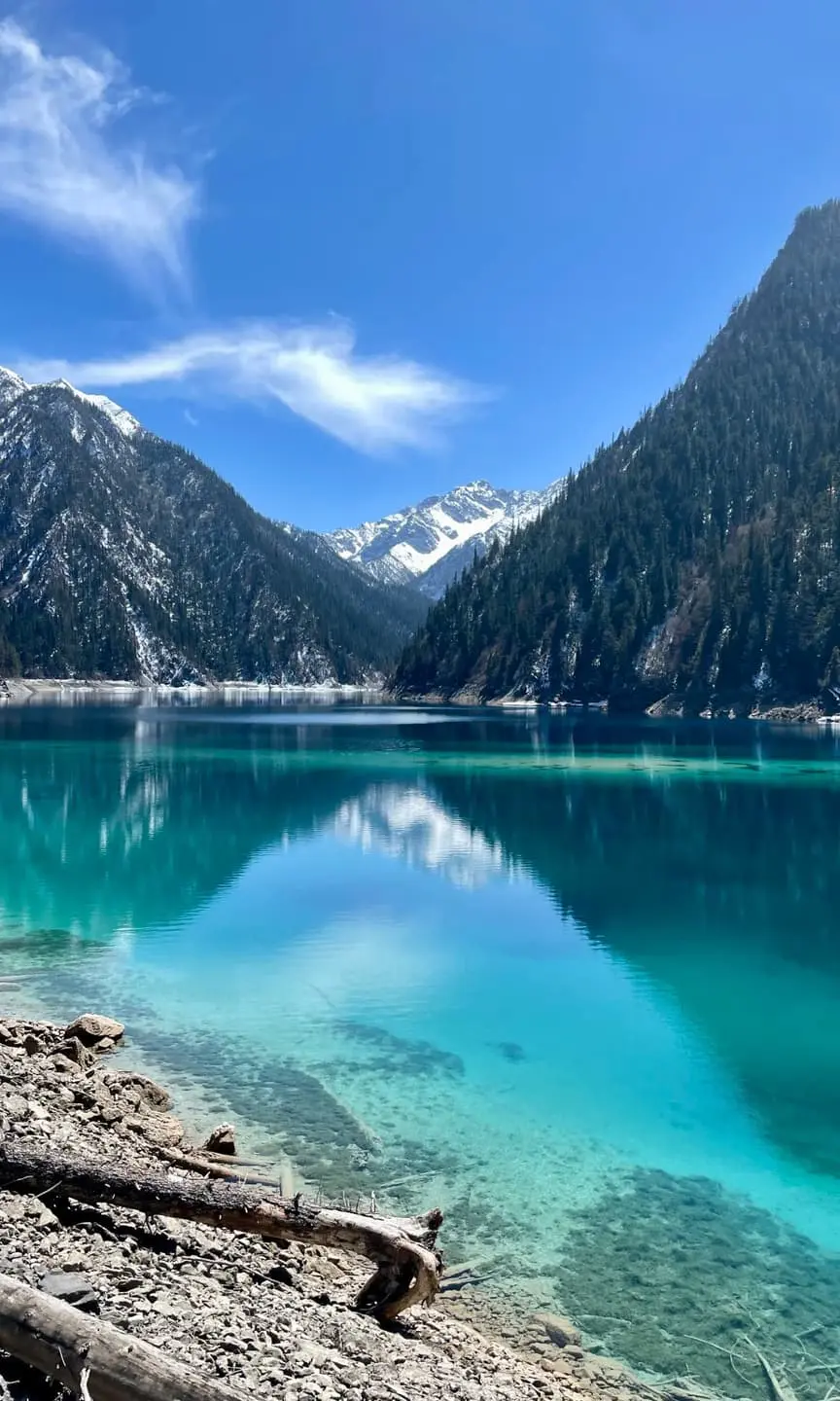 Jiuzhaigou lake and snow mountain reflection for a seven day Northern Sichuan route